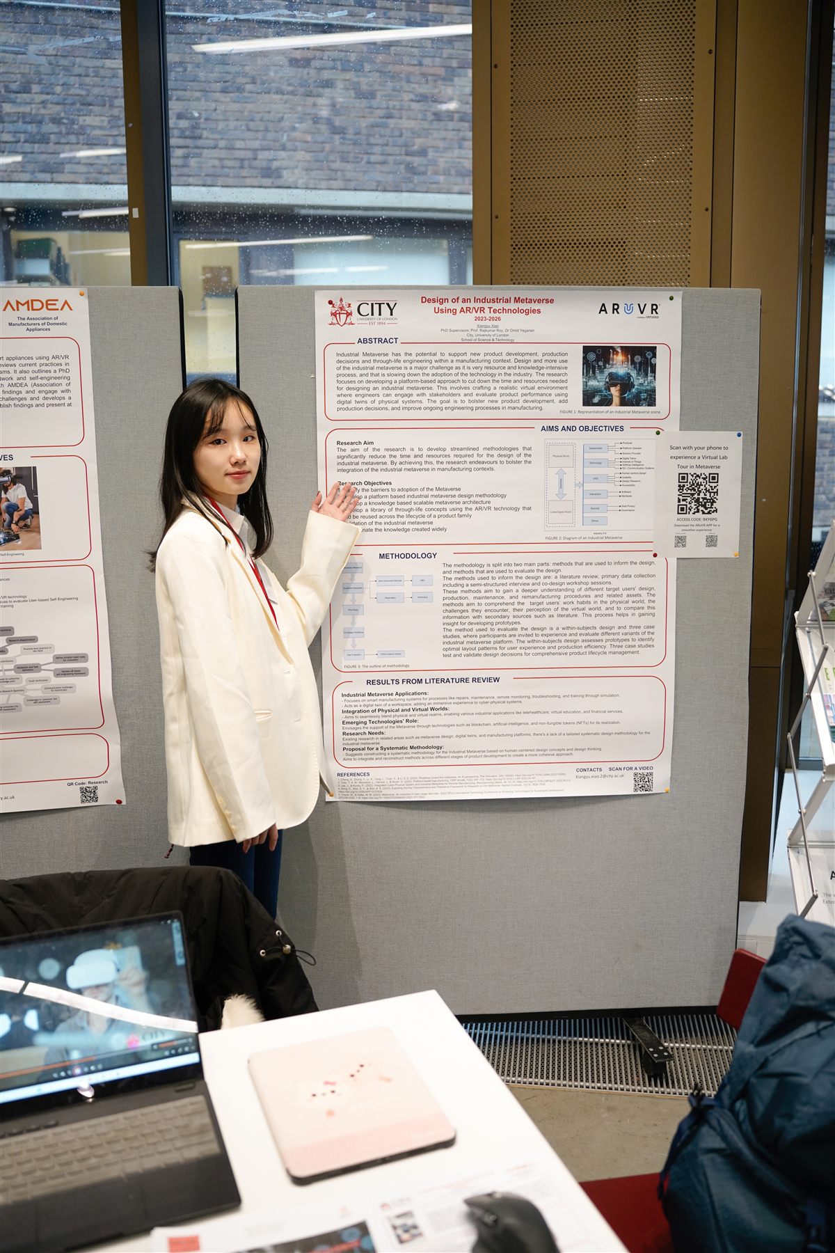 Presenting an Industrial Metaverse research poster.