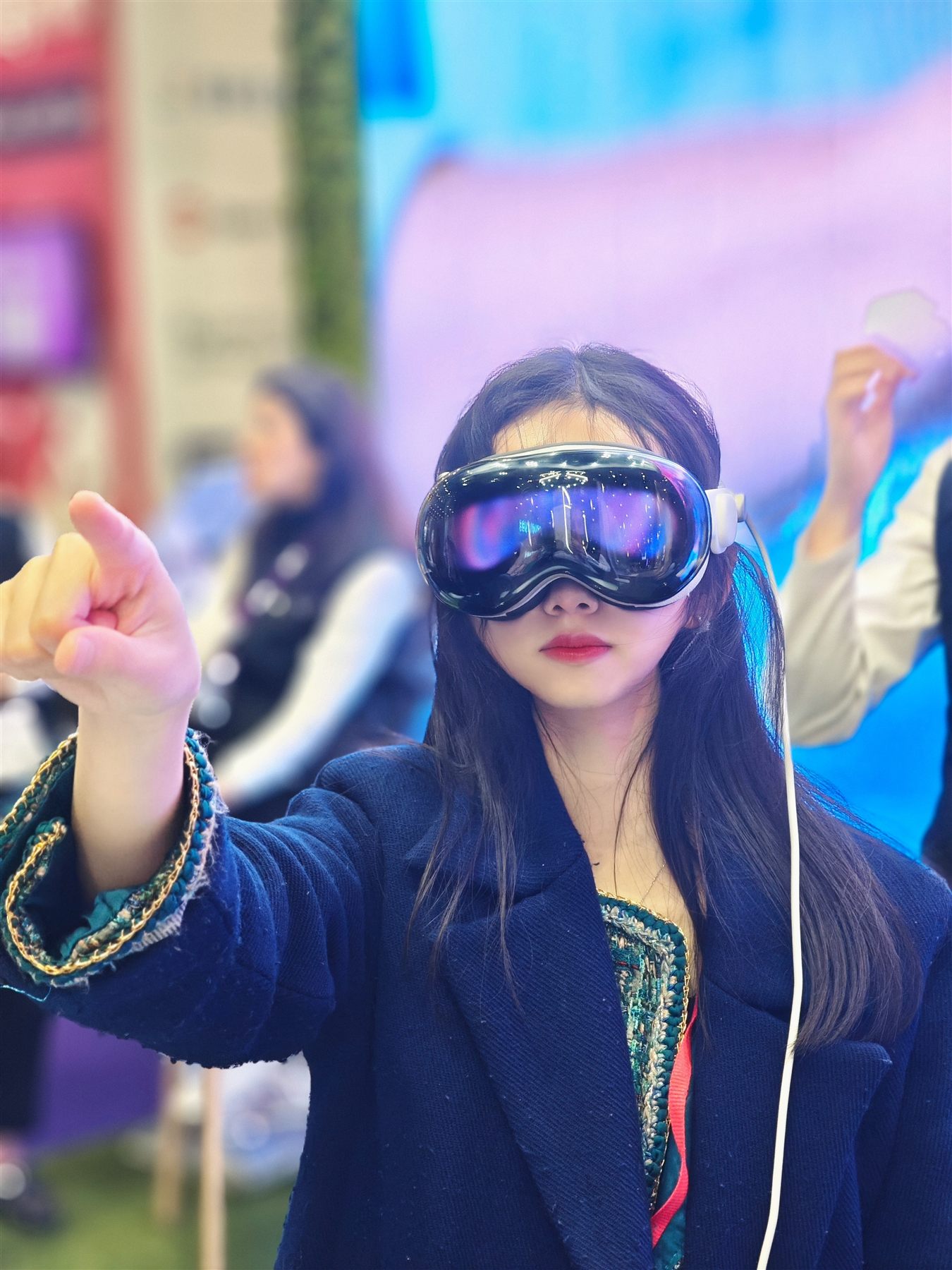 Trying an XR headset at an event.